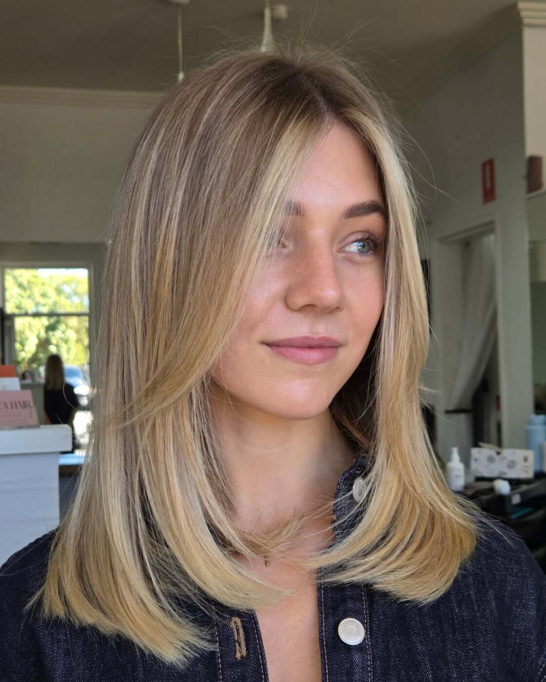 Bright blonde lob with face-framing pieces