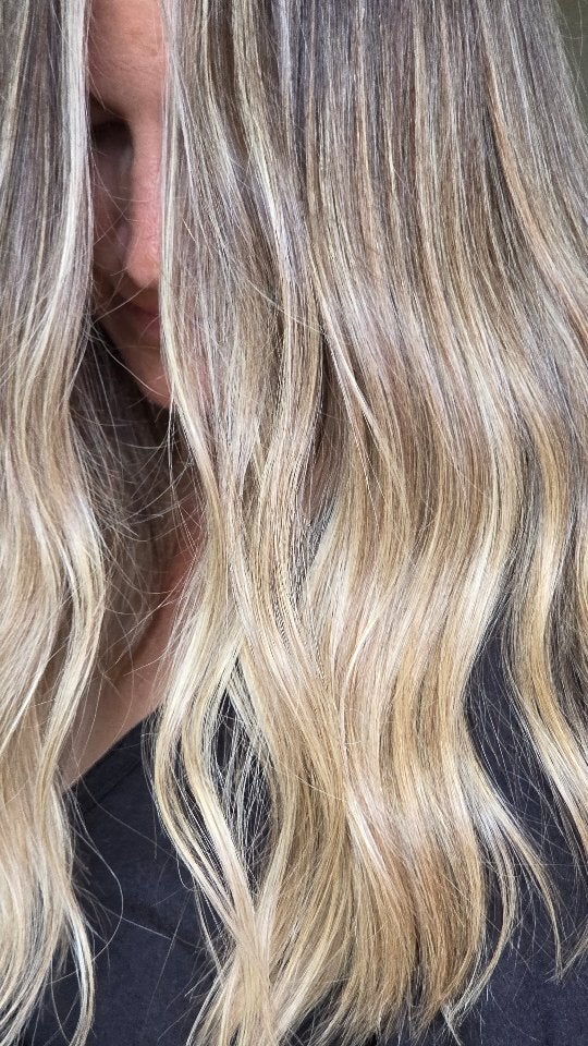 Close-up of blonde balayage lengths