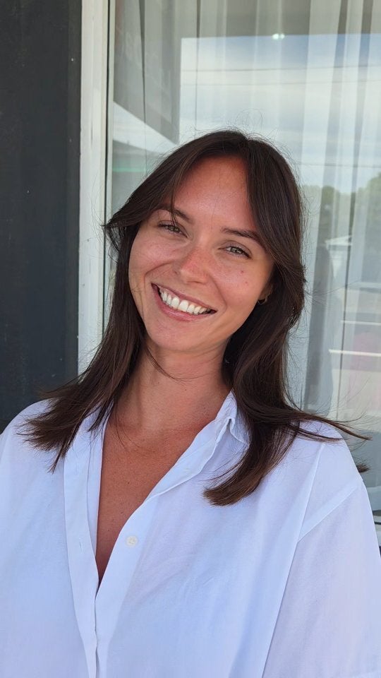 Shoulder-length layers with a curtain fringe